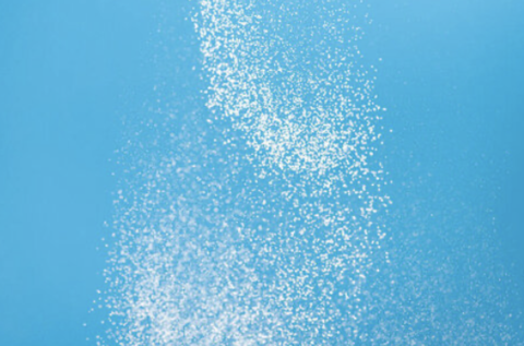 Sky blue backdrop with flecks of white powder